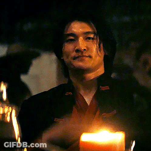 Man Giving Middle Finger Near Candle GIF