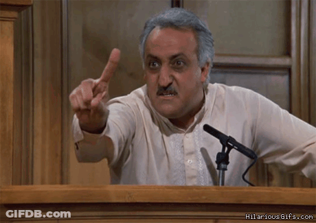 Man Giving Speech At Microphone GIF