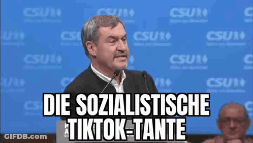 Man Giving Speech At Podium With Microphone GIF