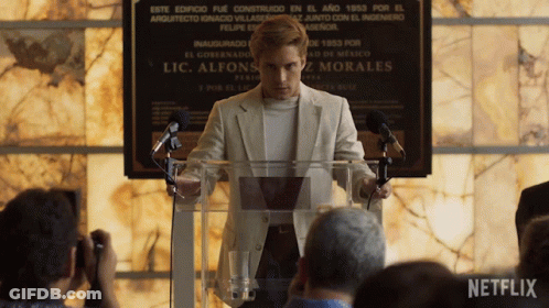 Man Giving Speech At Podium With Netflix Logo GIF