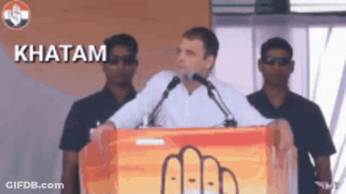 Man Giving Speech At Podium With Word Khatam GIF