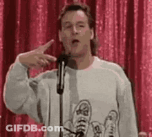 Man Giving Speech In Sweater With Shoes GIF
