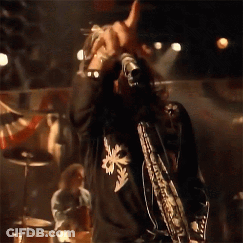 Man Giving Thumbs Up Holding Microphone Saying You GIF