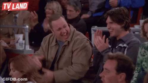 Man Giving Thumbs Up In Crowd With TV Land Logo GIF