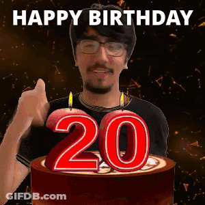 Man Giving Thumbs Up In Front Of Birthday Cake GIF