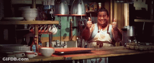 Man Giving Thumbs Up In Kitchen GIF