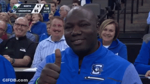 Man Giving Thumbs Up Watching Basketball GIF