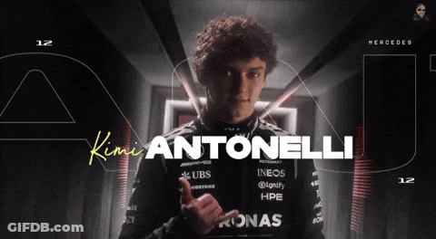 Man Giving Thumbs Up With Antonelli Behind GIF