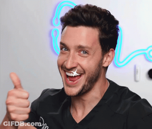 Man Giving Thumbs Up With Star On Face GIF
