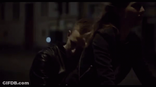 Man Giving Woman Piggyback Ride GIF