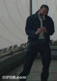 Man Giving Woman Piggyback Ride While She Screams GIF