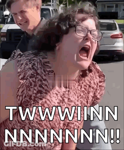 Man Giving Woman Piggyback Ride While She Screams GIF