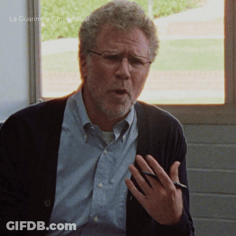 Man Glasses Cardigan Talking La Guarimba Film Festival GIF