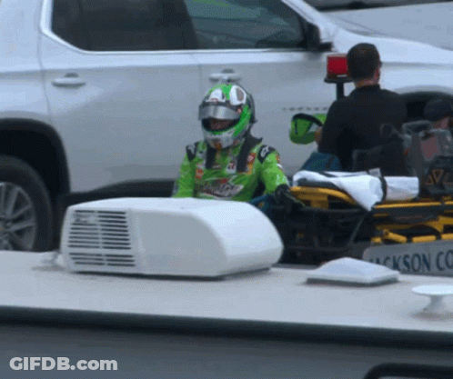 Man Green Helmet On Stretcher Jackson Co Truck GIF