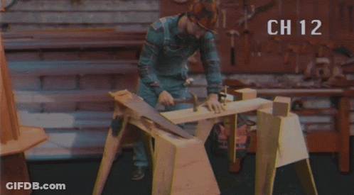 Man Hammering Nail With Ch 12 Above GIF