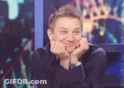 Man Hands On Face Smiling At Camera GIF