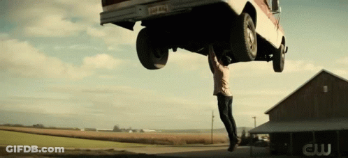 Man Hanging Upside Down From Truck GIF