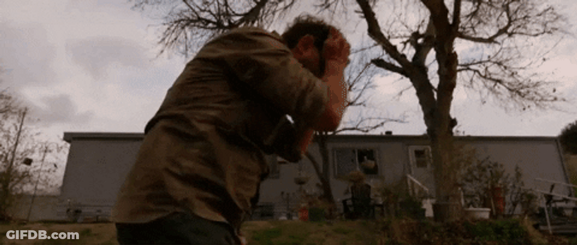 Man Having A Headache While Walking GIF