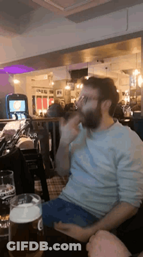 Man Having Beer Gun To Head  Playful GIF