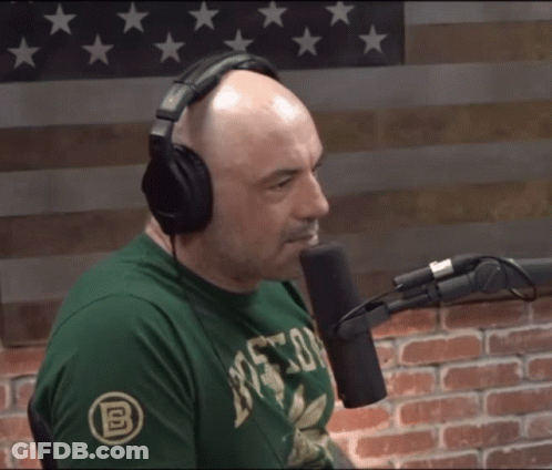 Man Headphones Green 'Boston' Shirt Talks Into Mic GIF