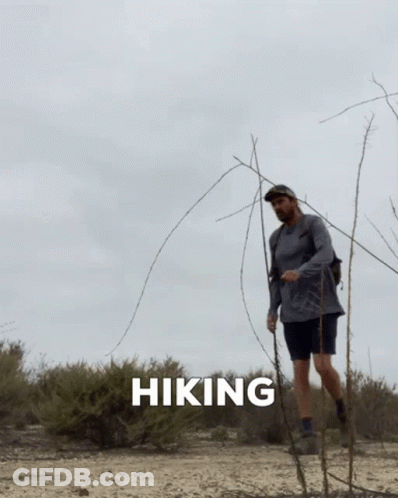 Man Hiking In Desert With Hiking Text GIF