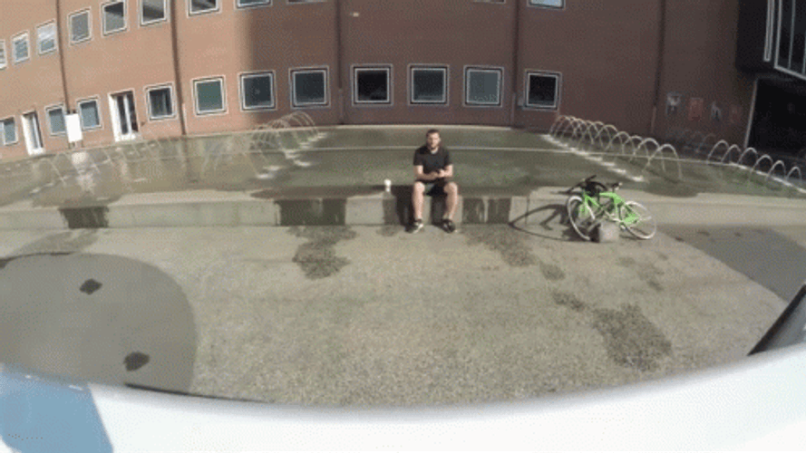 Man Hit By Giant Pokeball Prank GIF