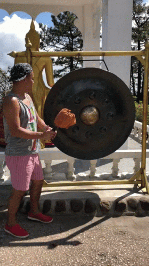 Man Hitting Gong GIF