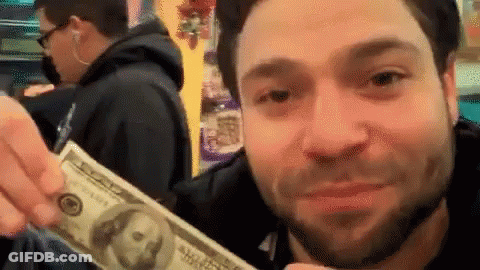 Man Holding 100 Dollar Bill GIF