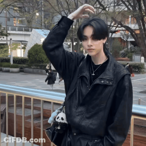 Man Holding 12Bet Jersey GIF