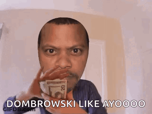 Man Holding 20 Dollar Bill In Front Of Face GIF