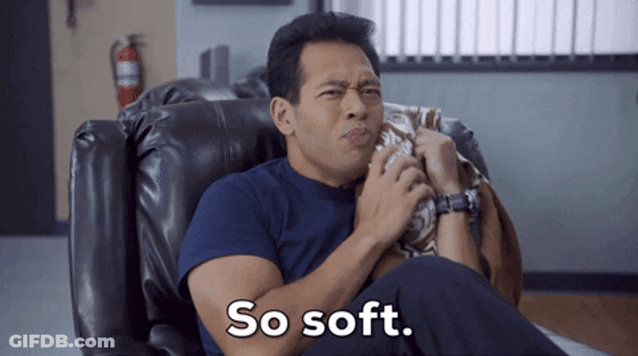 Man Holding A Soft Blanket GIF