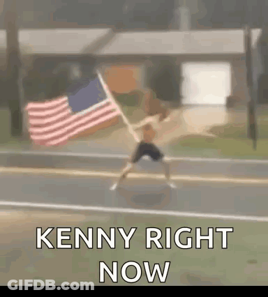 Man Holding American Flag On Roadside GIF