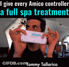 Man Holding Amico Controller With Caption I Give Every Amico Controller A Full Sp GIF