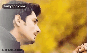 Man Holding Another Man's Hand Looking GIF