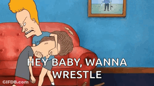 Man Holding Another On Couch GIF