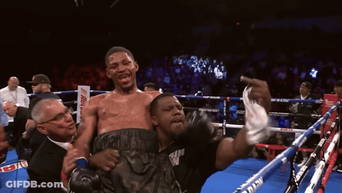 Man Holding Another On Shoulders Miller Lite Sign In Boxing Ring GIF