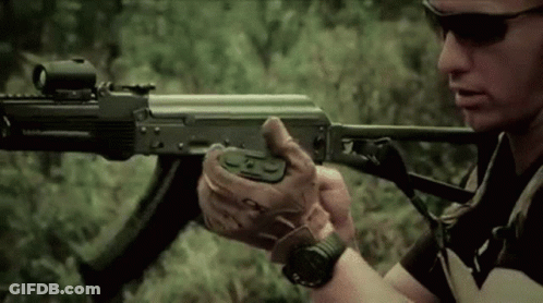 Man Holding Assault Rifle GIF