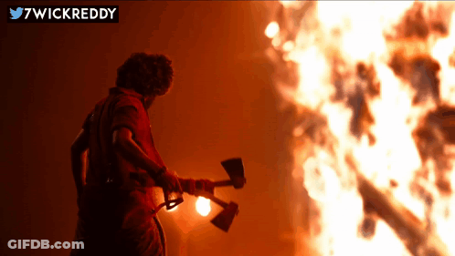 Man Holding Axe By Fire 7Wickreddy GIF