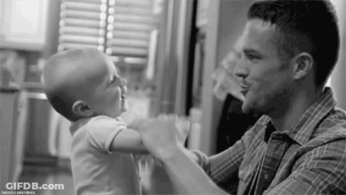 Man Holding Baby GIF