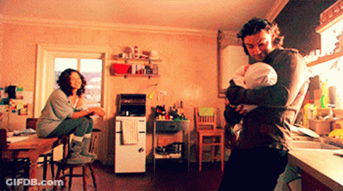 Man Holding Baby GIF