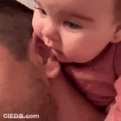 Man Holding Baby Biting Face GIF