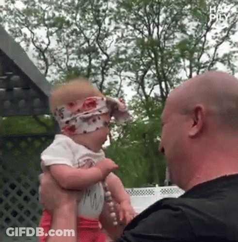 Man Holding Baby Girl With Headband GIF