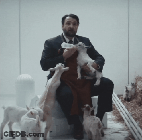 Man Holding Baby Goat Saying You Can't Take Them Yet GIF
