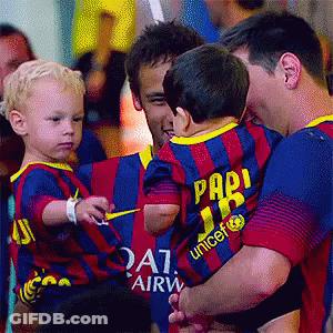 Man Holding Baby In Pari Unicef Shirt GIF