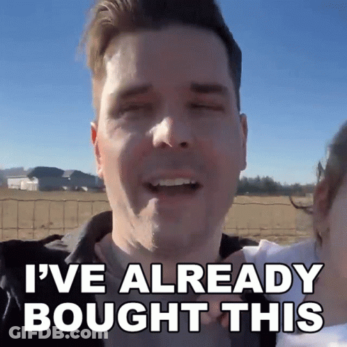 Man Holding Baby Saying Already Bought GIF