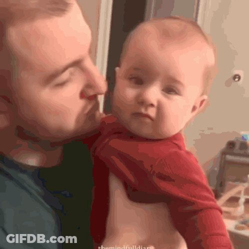 Man Holding Baby The Mindful Diary GIF