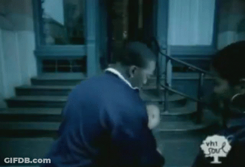Man Holding Baby While Woman Watches GIF
