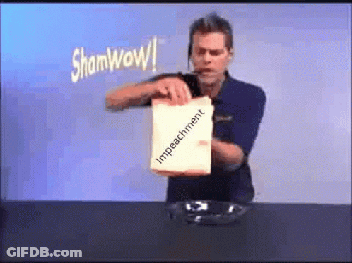 Man Holding Bag Of Impeachment Powder GIF