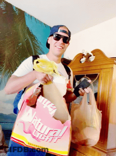 Man Holding Bag Saying Natural Light GIF