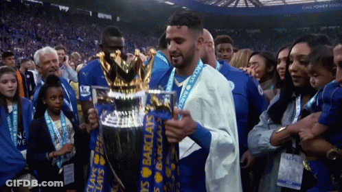 Man Holding Barclay's Trophy GIF